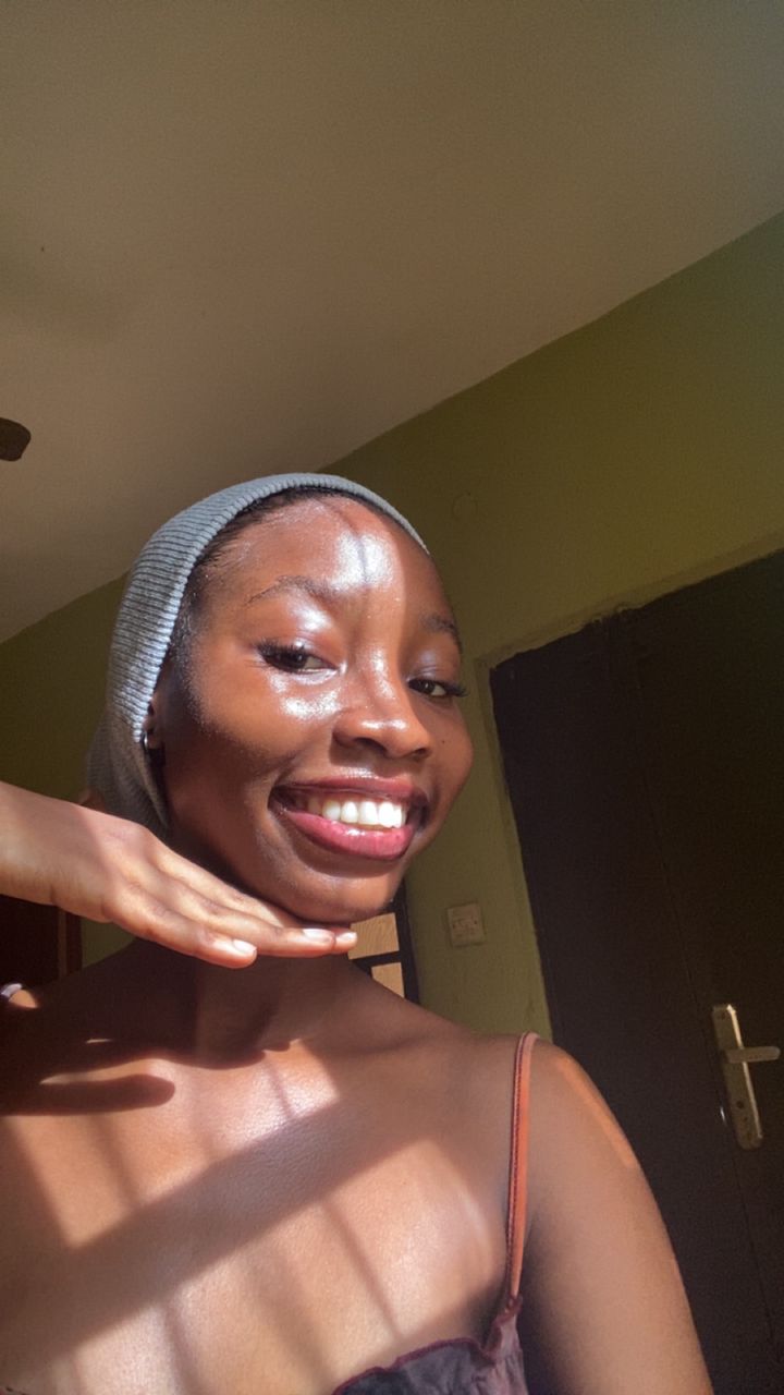 Abby smiling in the sun